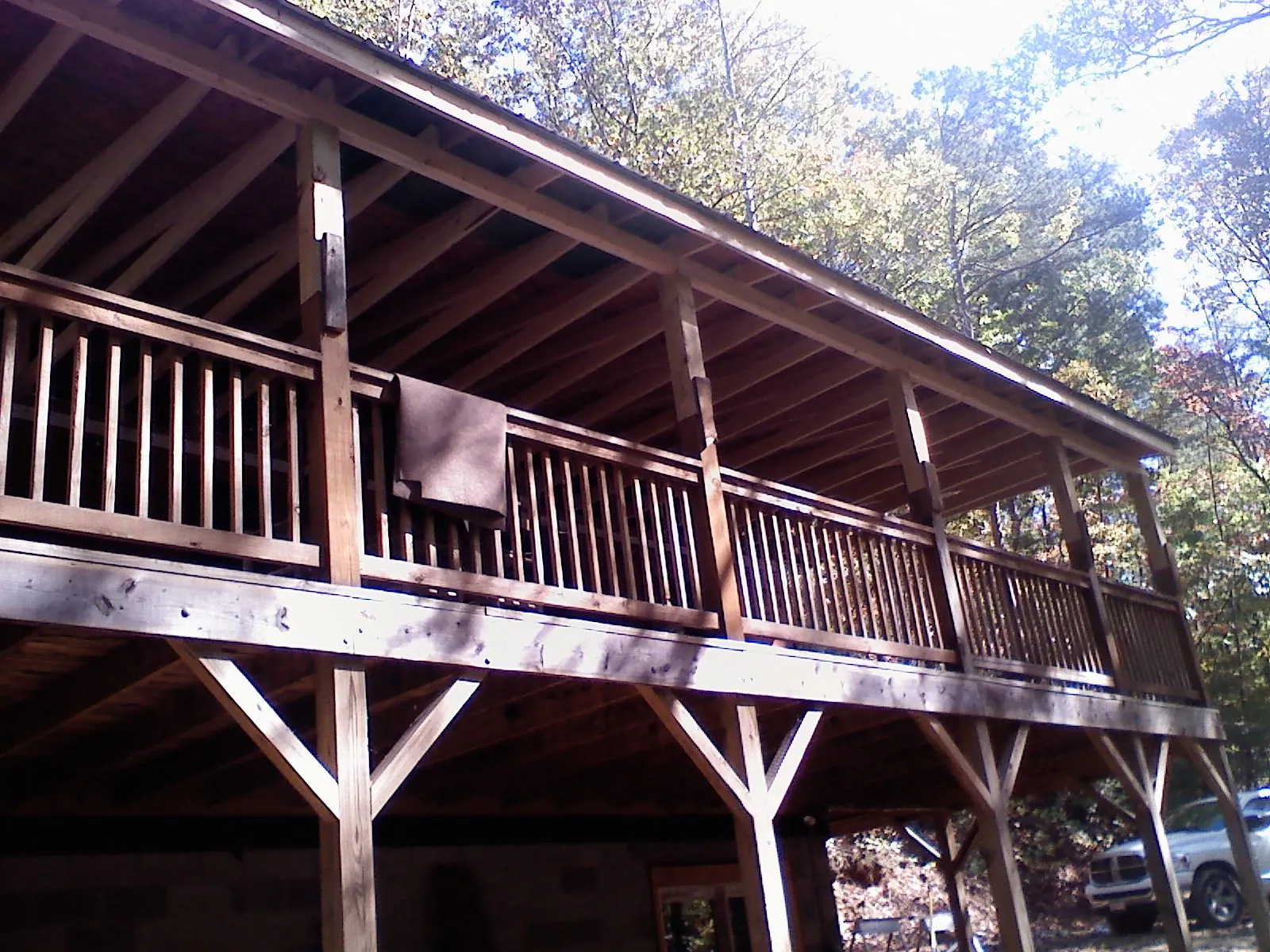 Timber framing under a new elevated porch and deck — Roof Leak Repair in Laurelville by Roofing Brothers